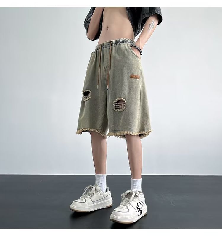 Femilina - Mid Rise Washed Distressed Denim Shorts