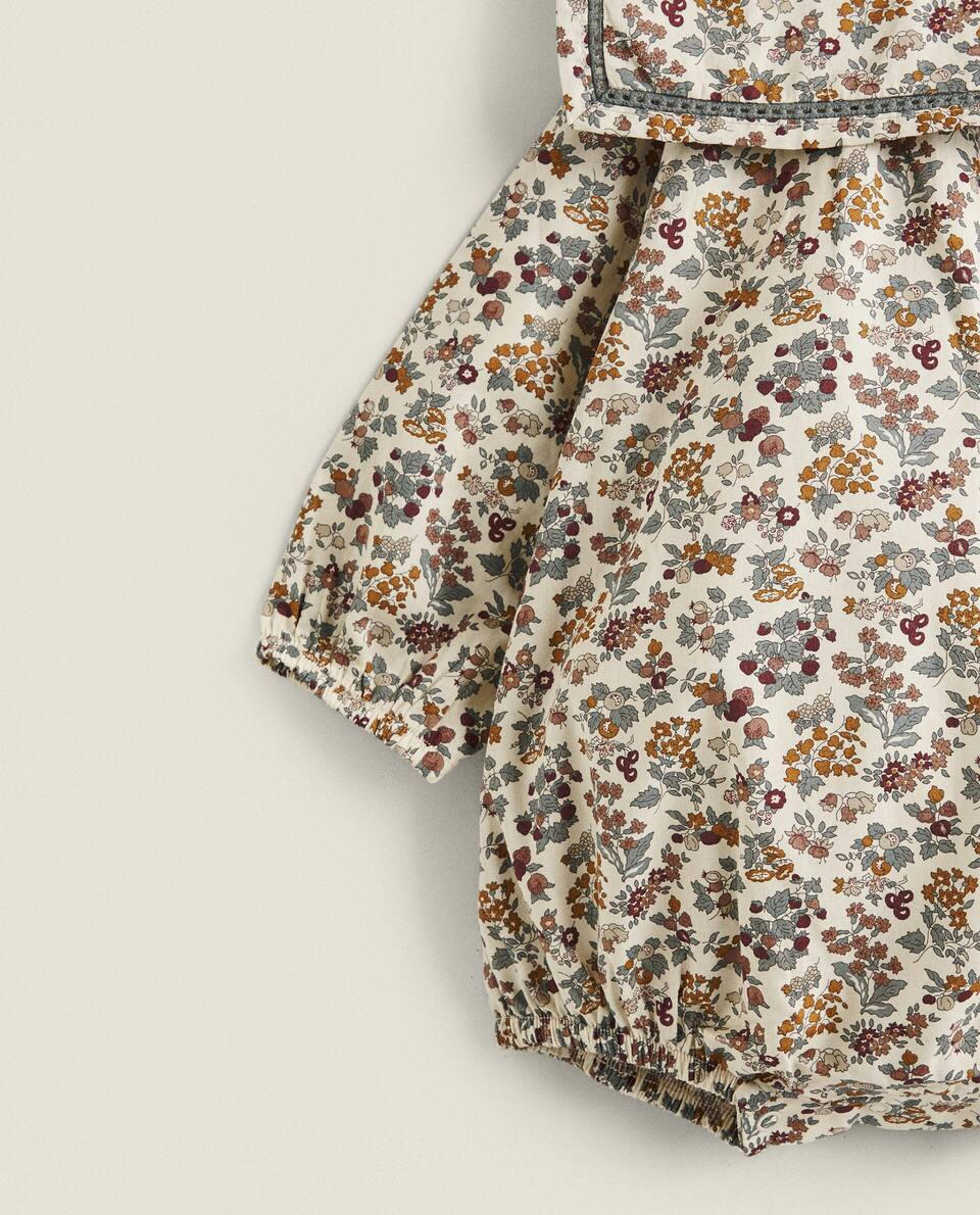 Body infantil em tecido com estampa floral