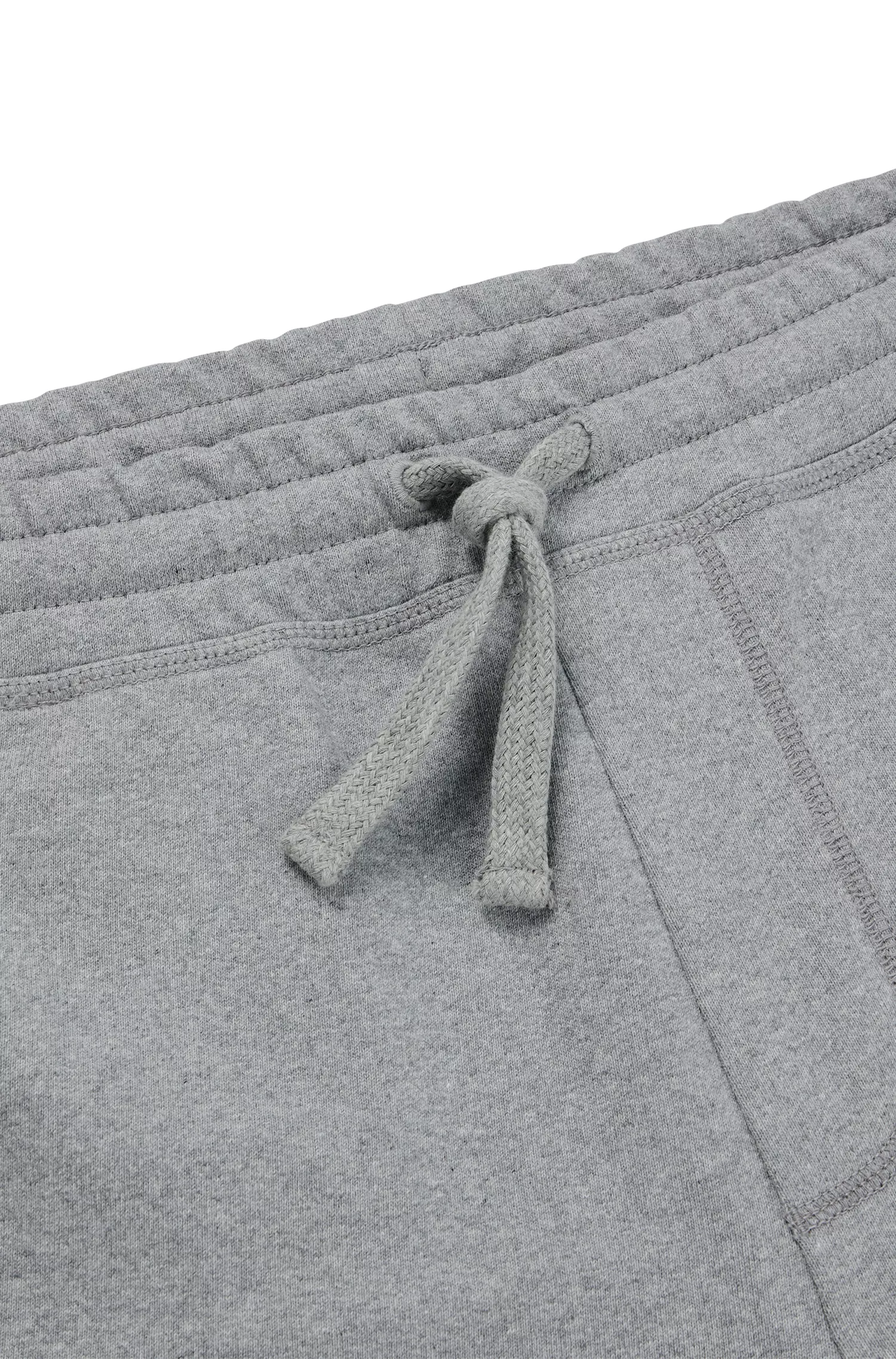 Calça de fato de treino BOSS laranja, corte relaxado, em algodão felpudo francês.