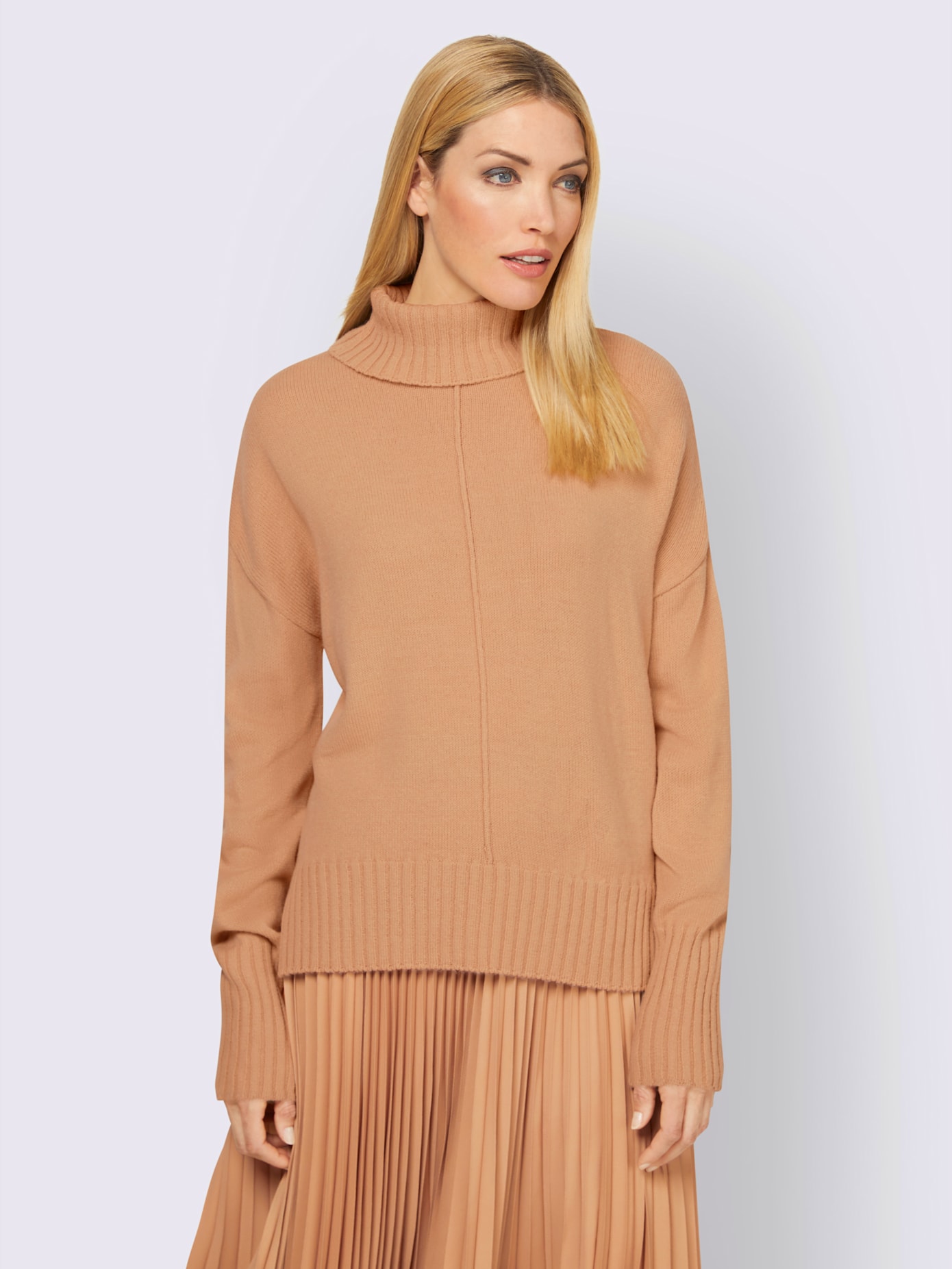 Pull col roulé flatteur