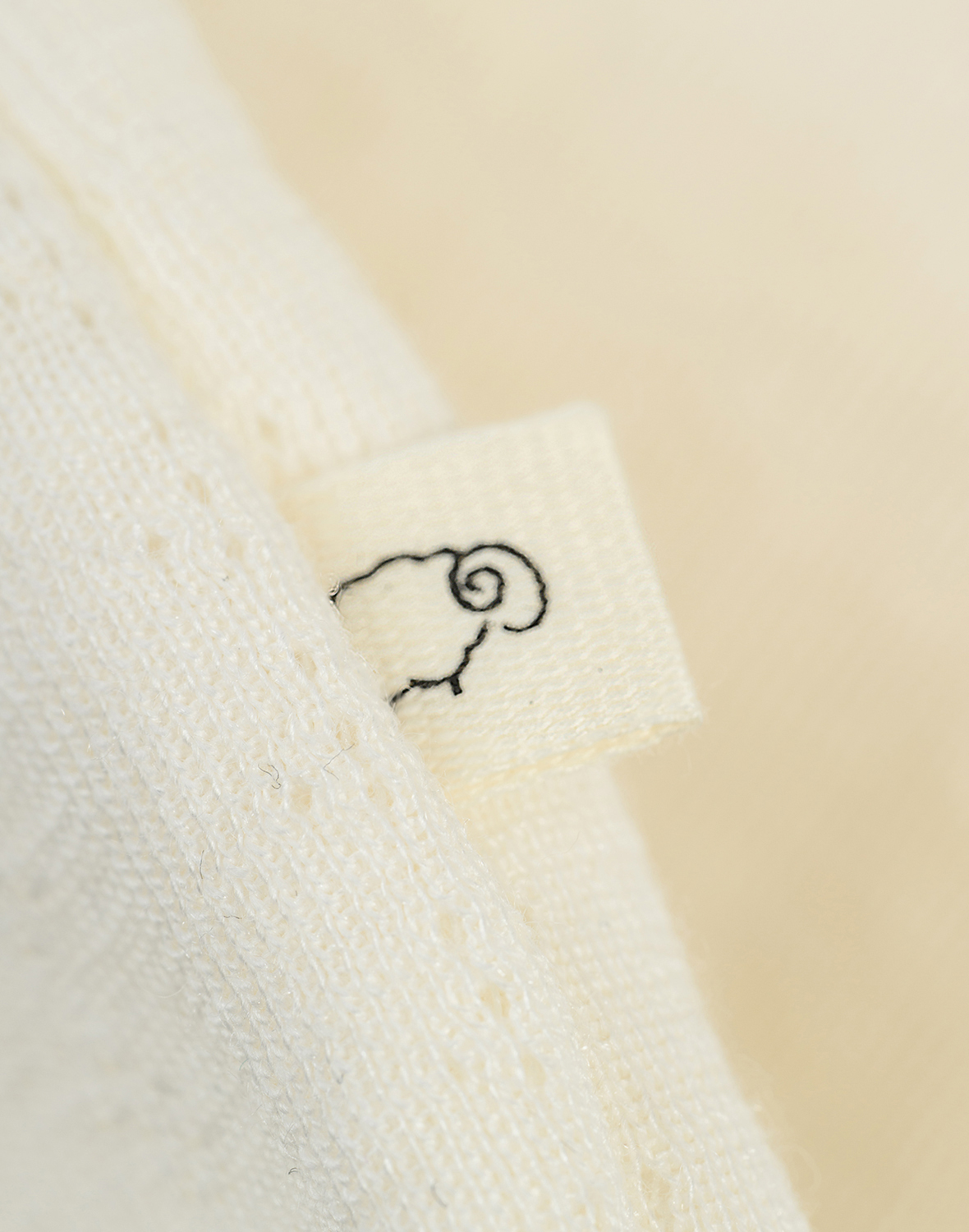 Pointelle romper zonder mouw van merinowol/zijde voor baby's