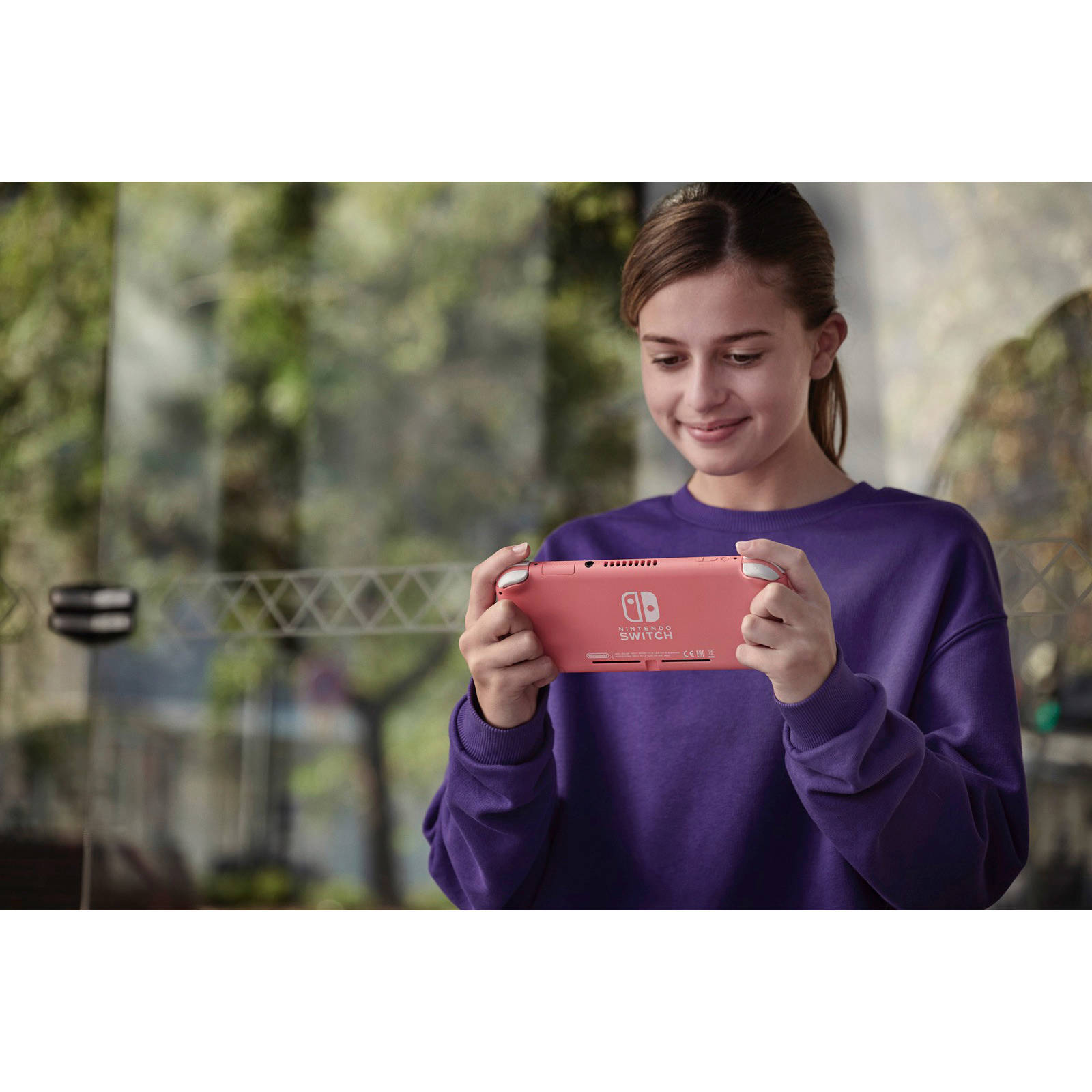 Nintendo Switch Lite koraal