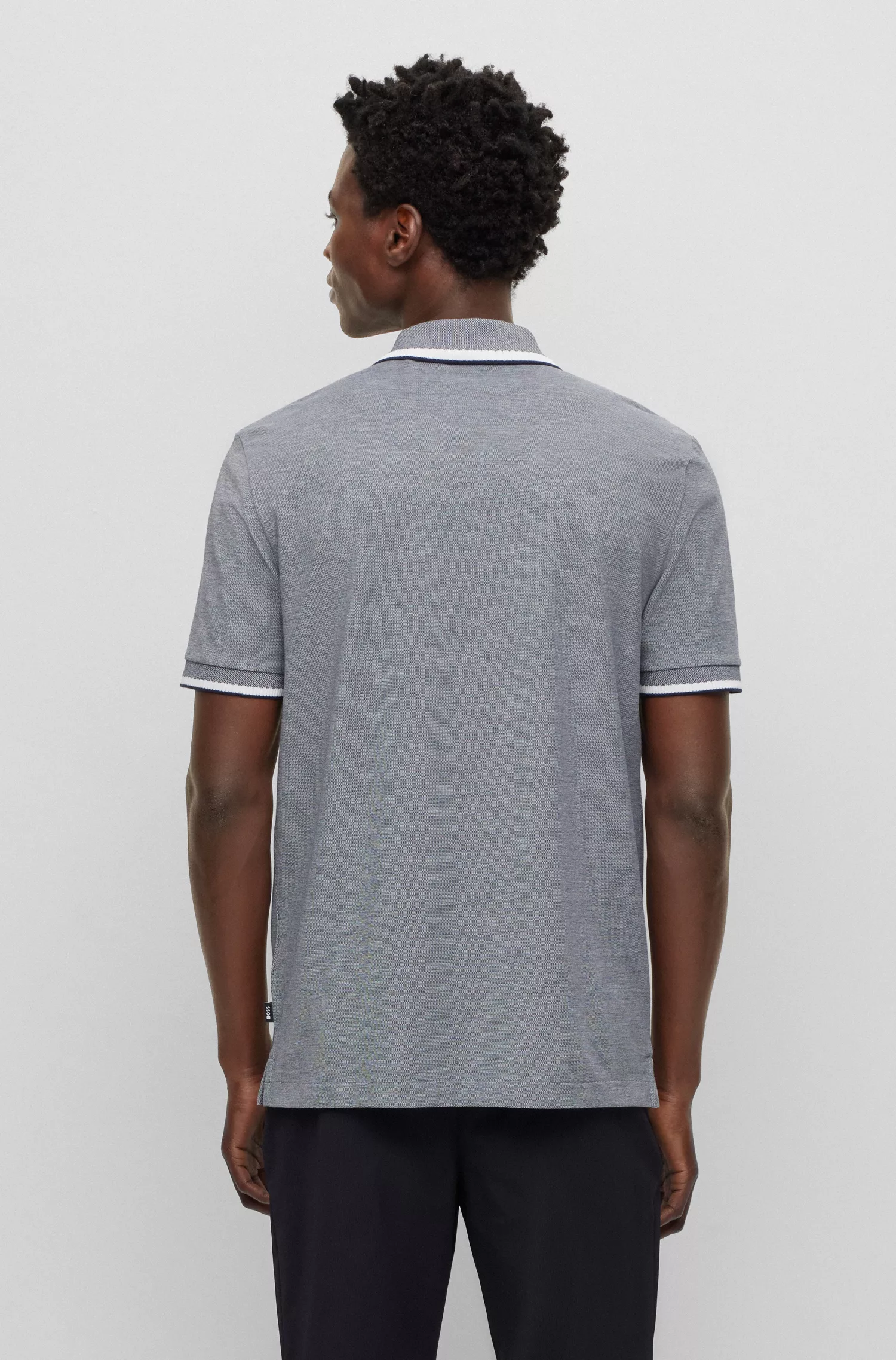 Camisa polo BOSS preta em piqué de algodão com logotipo bordado.