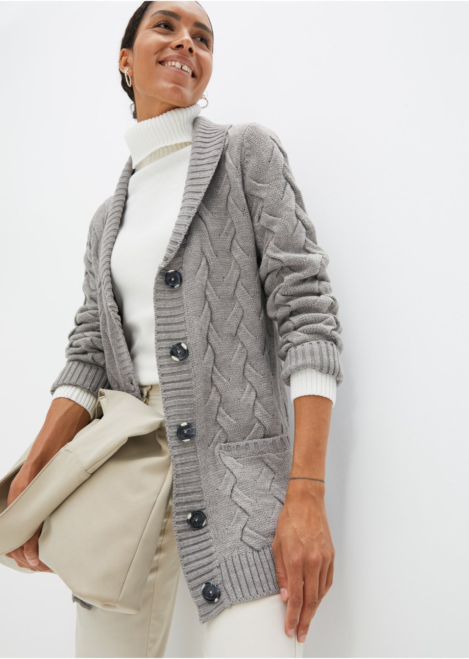 Gilet en maille à col châle et motif torsadé