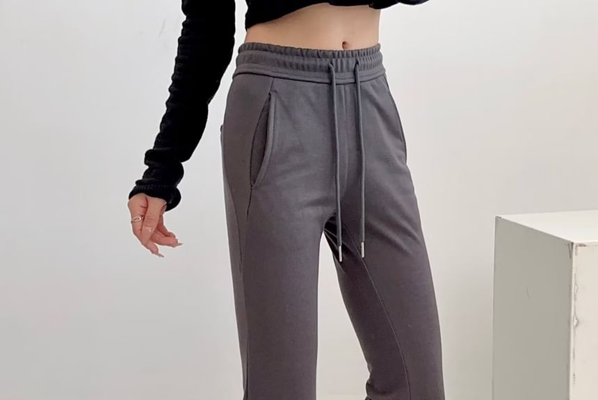 Osion - Effen wijd uitlopende joggingbroek met trekkoord in de taille