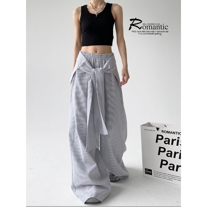 Rosesand - Gestreepte, losse, wijde broek met lage taille
