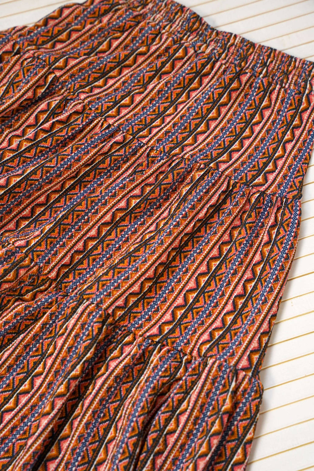 B.Nosy rok met all over print en volant brique/blauw