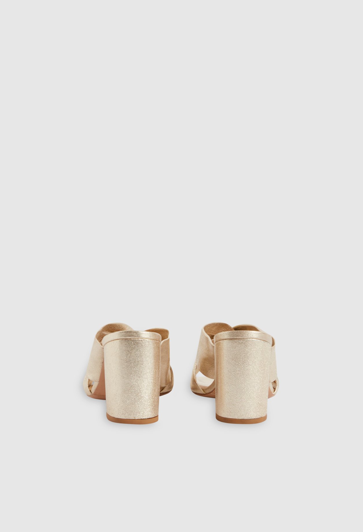 Mules en cuir dore