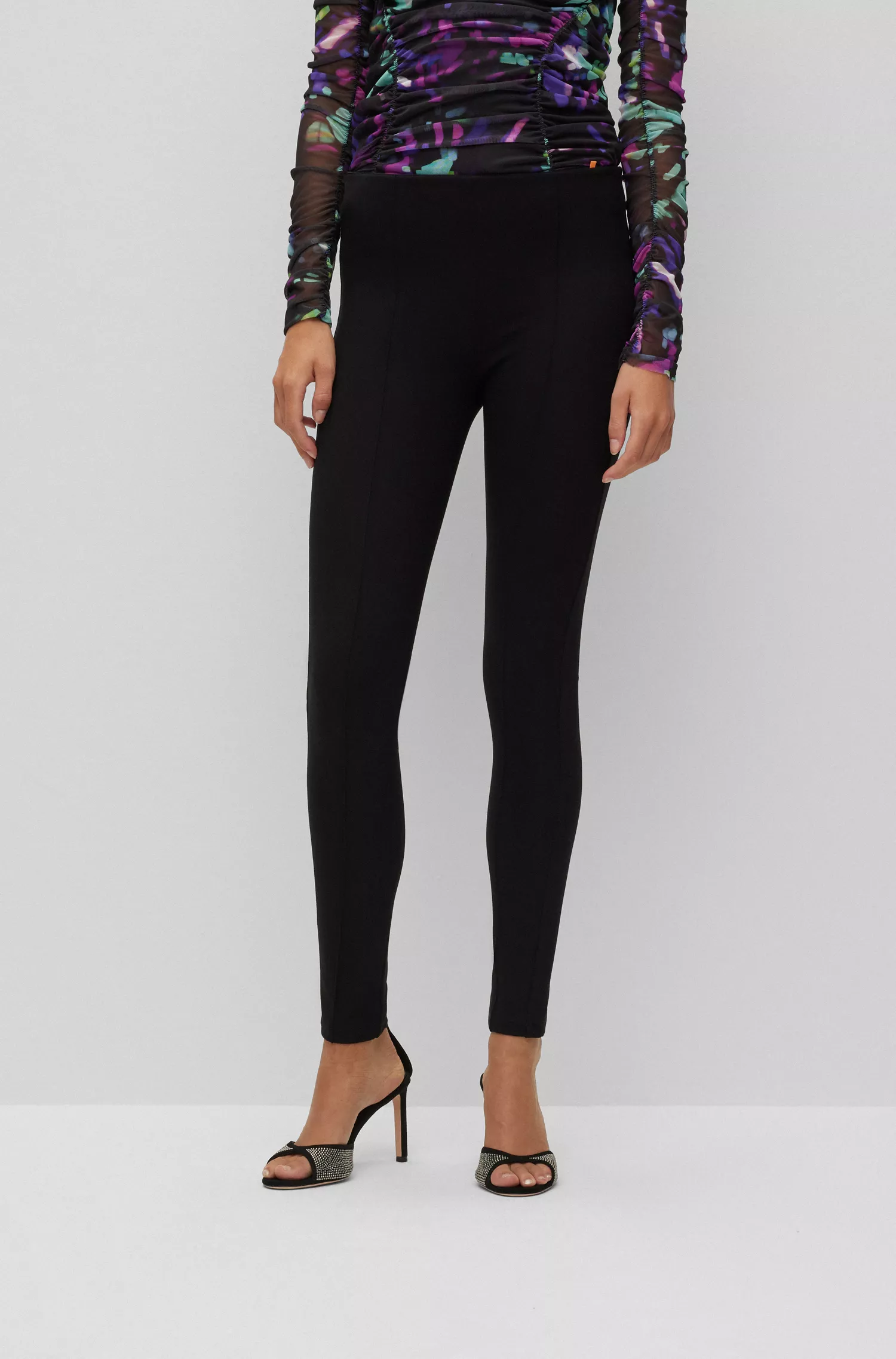 Leggings BOSS laranja, extra justas, em malha super elástica.