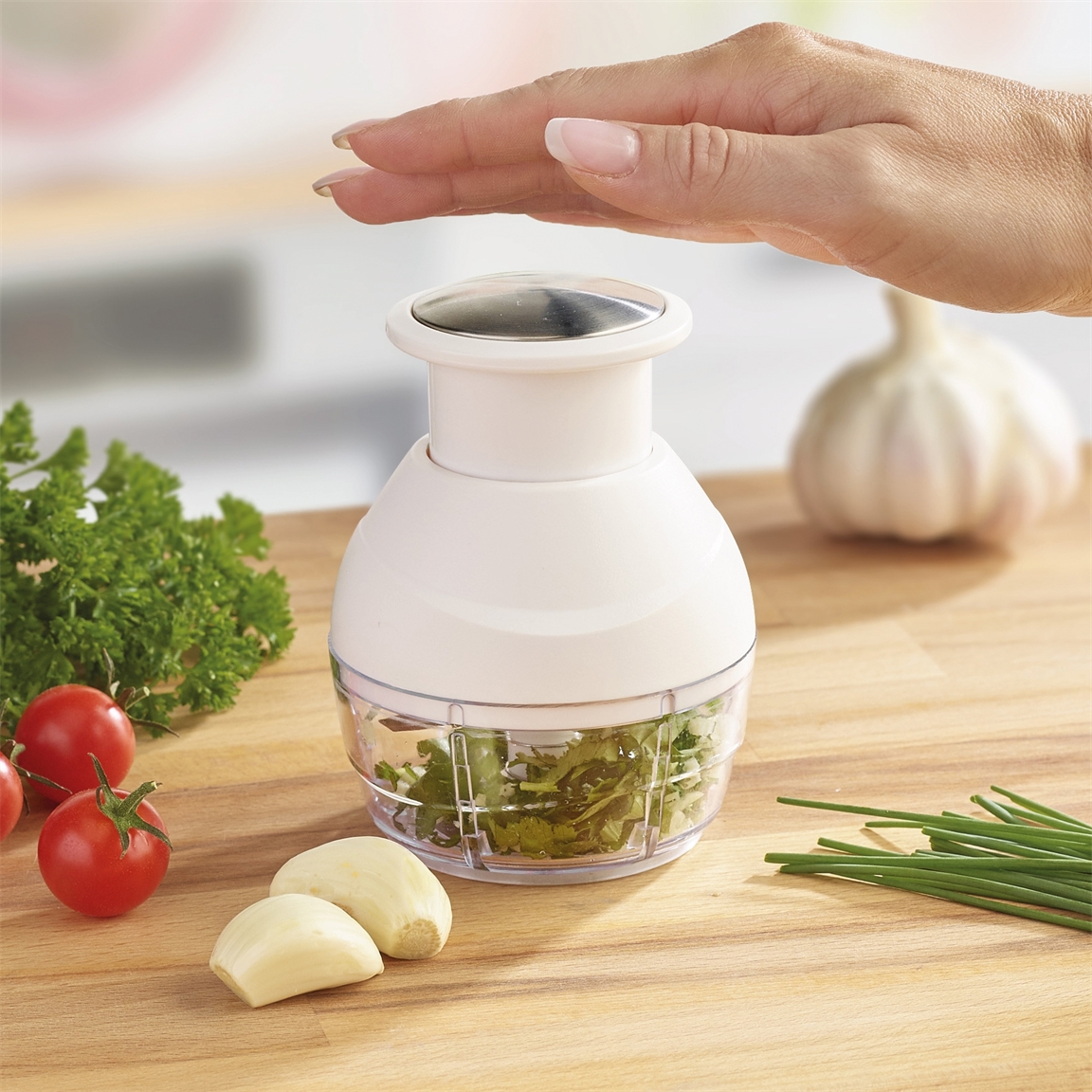 Mini-hachoir à herbes