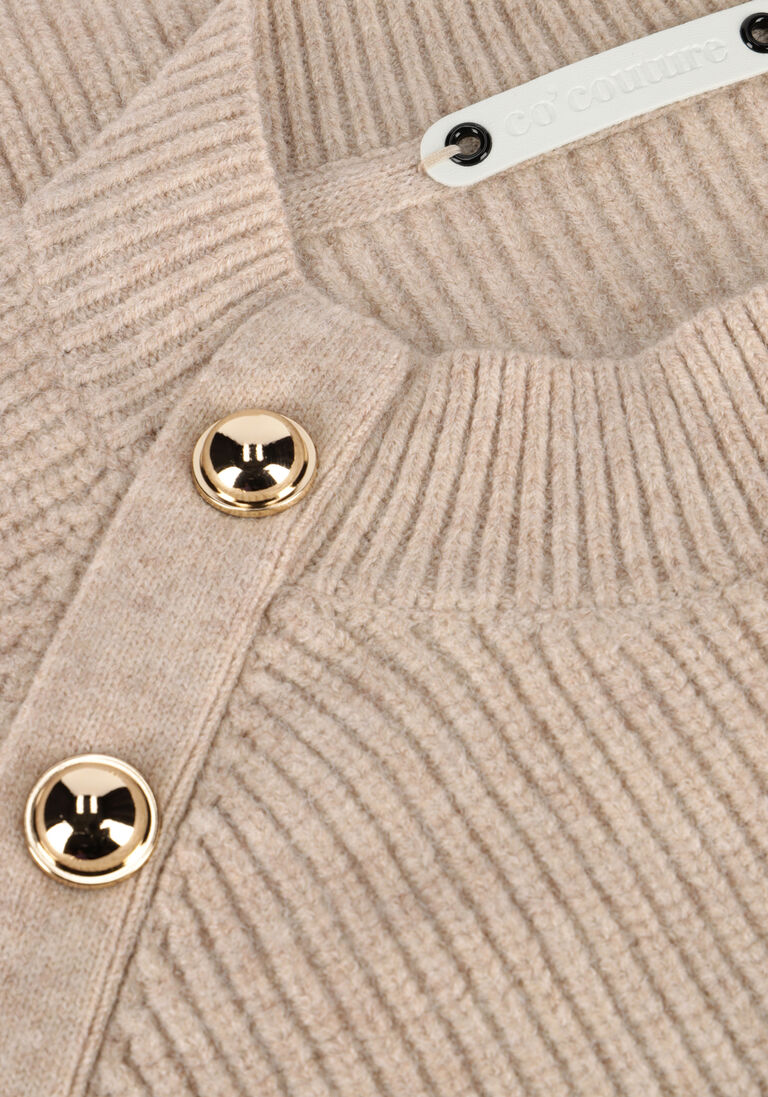 beige co'couture trui the row officer rib knit