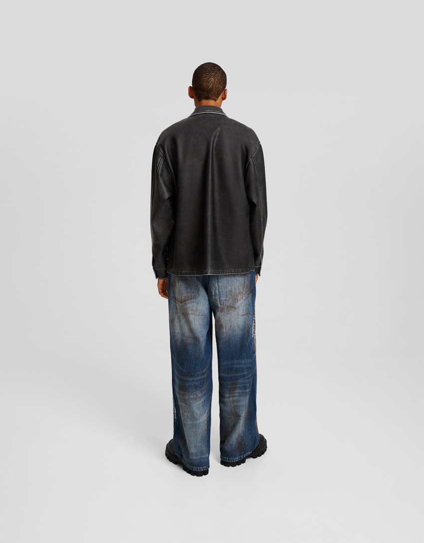 Calça jeans super larga com estampa de respingos de tinta