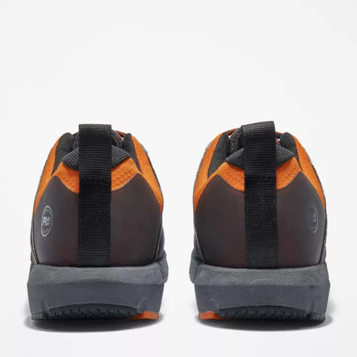 Sapato de trabalho Radius com biqueira de liga metálica para homens, nas cores preto e laranja.