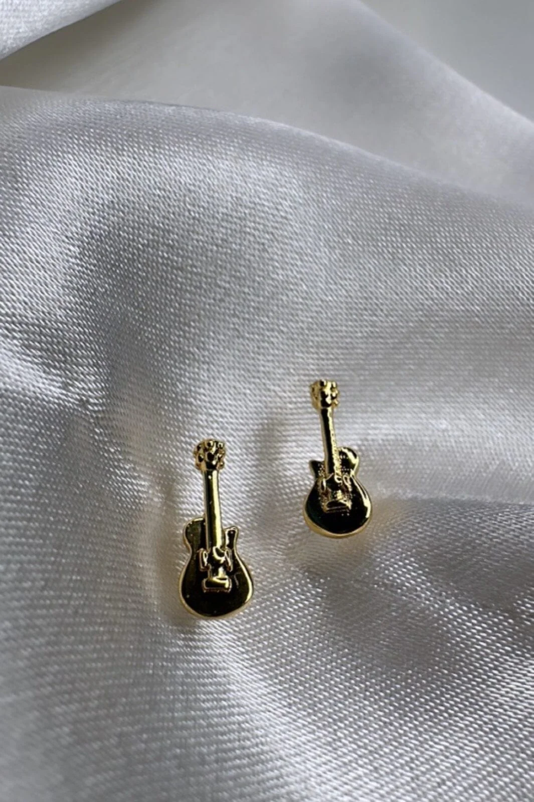 O element You Rock Guitar Earstick