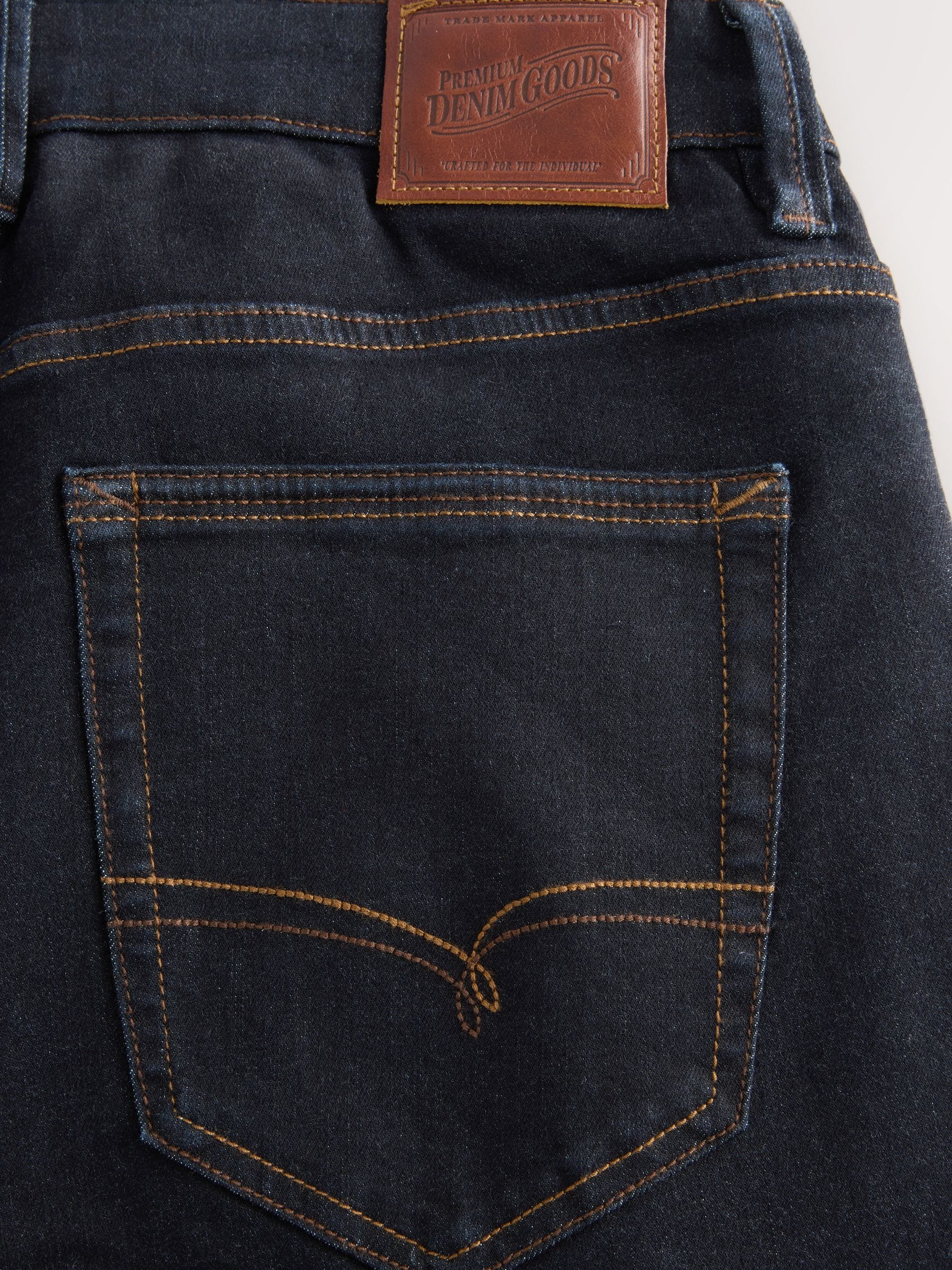 Blauw met wassing - Standaard toelopende pasvorm - Motionflex jeans