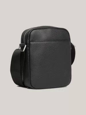 Bolsa pequena para repórter com detalhes em fita.
