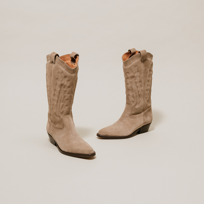 Bottes à bouts pointus et surpiqures apparentes  en croute taupe