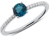 Diamanten ring in 14 karaat witgoud met blauwe Topaas