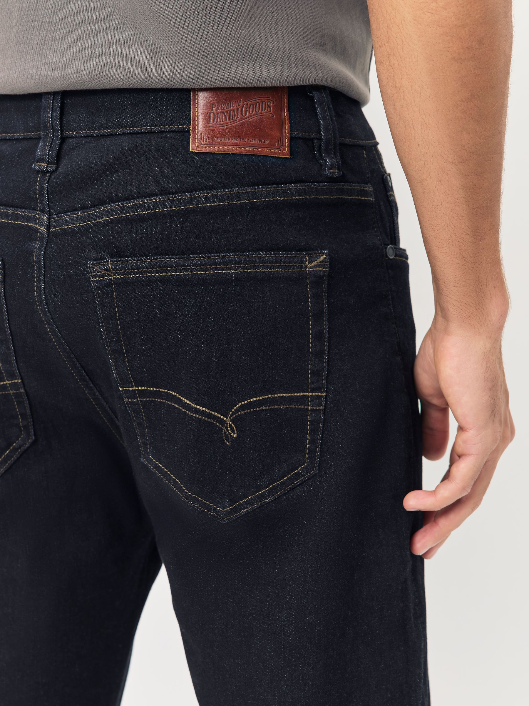 Blauw met wassing - Standaard toelopende pasvorm - Motionflex jeans