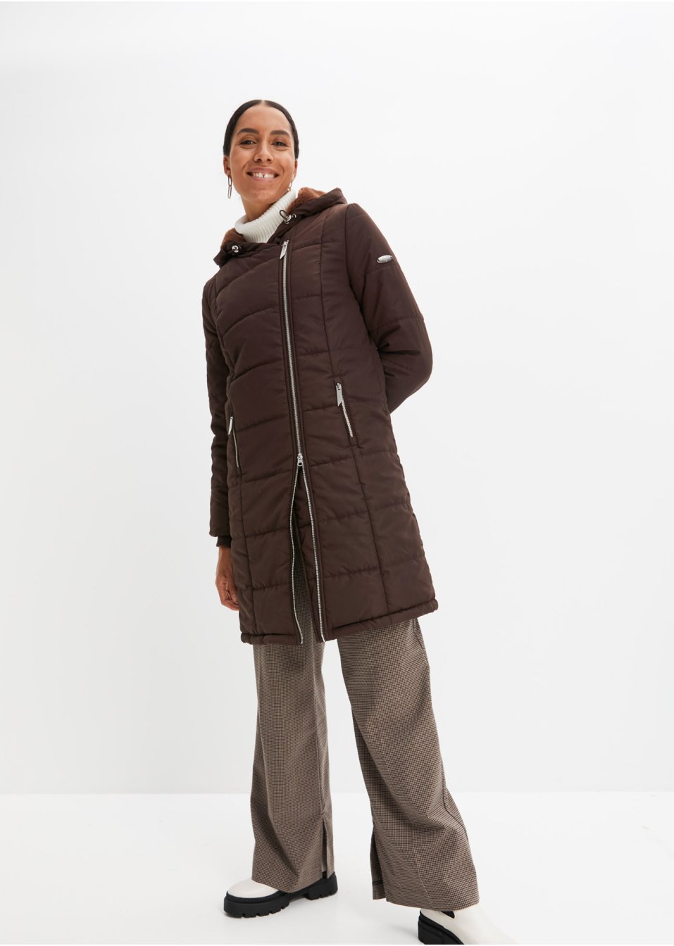 Manteau matelassé avec zip asymétrique