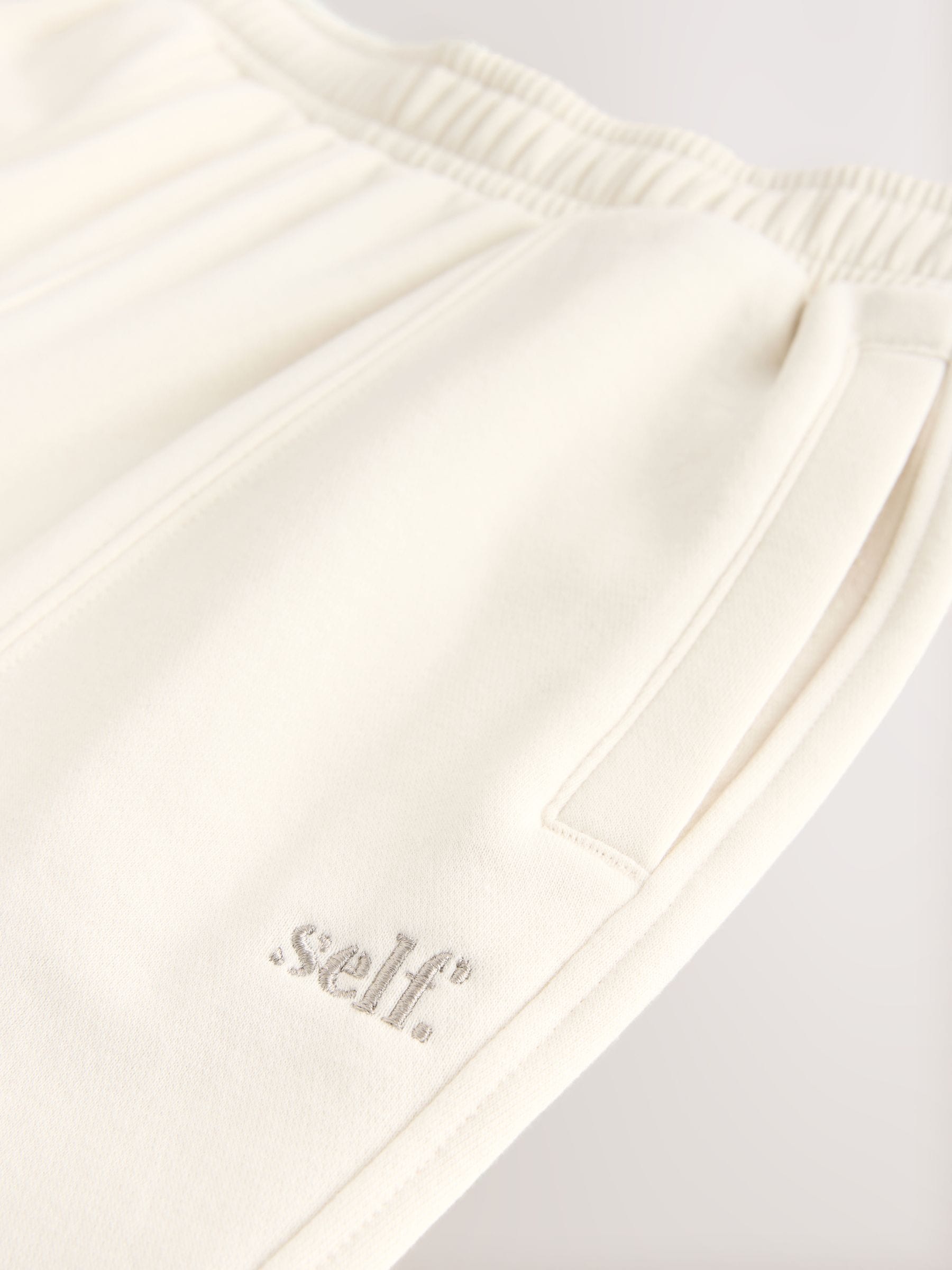 Ecru - self. Barrel Leg Joggers