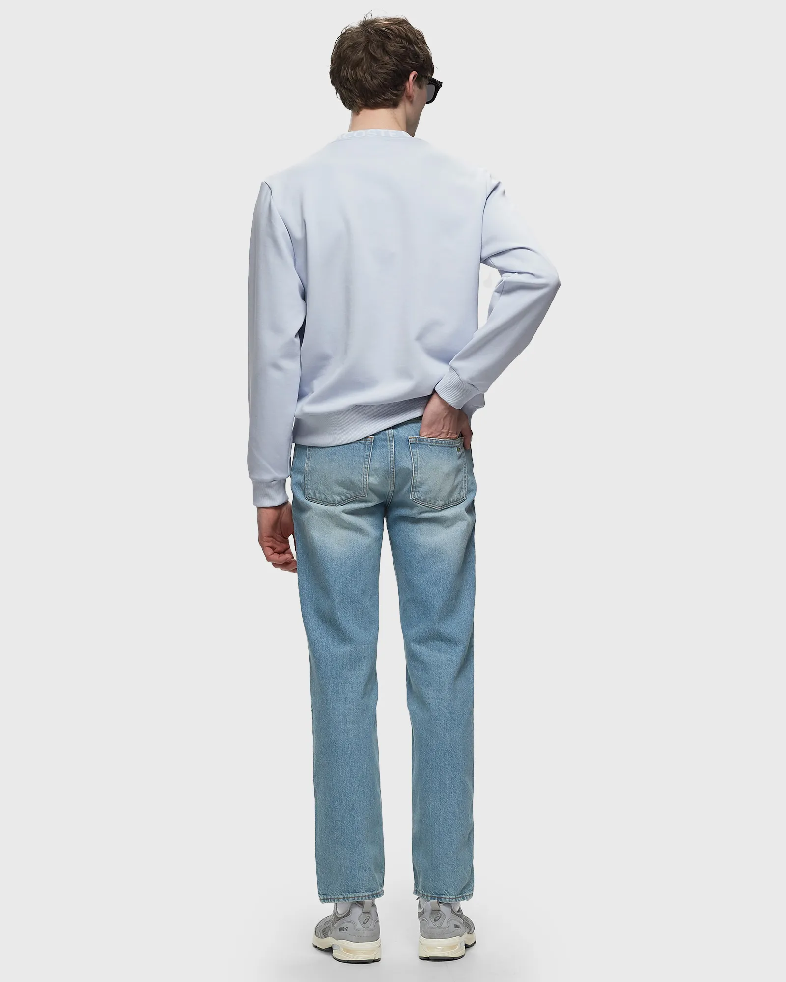 calça jeans Lacoste reta índigo