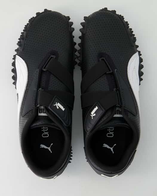 Puma Mostro Perf Sneaker in Schwarz
