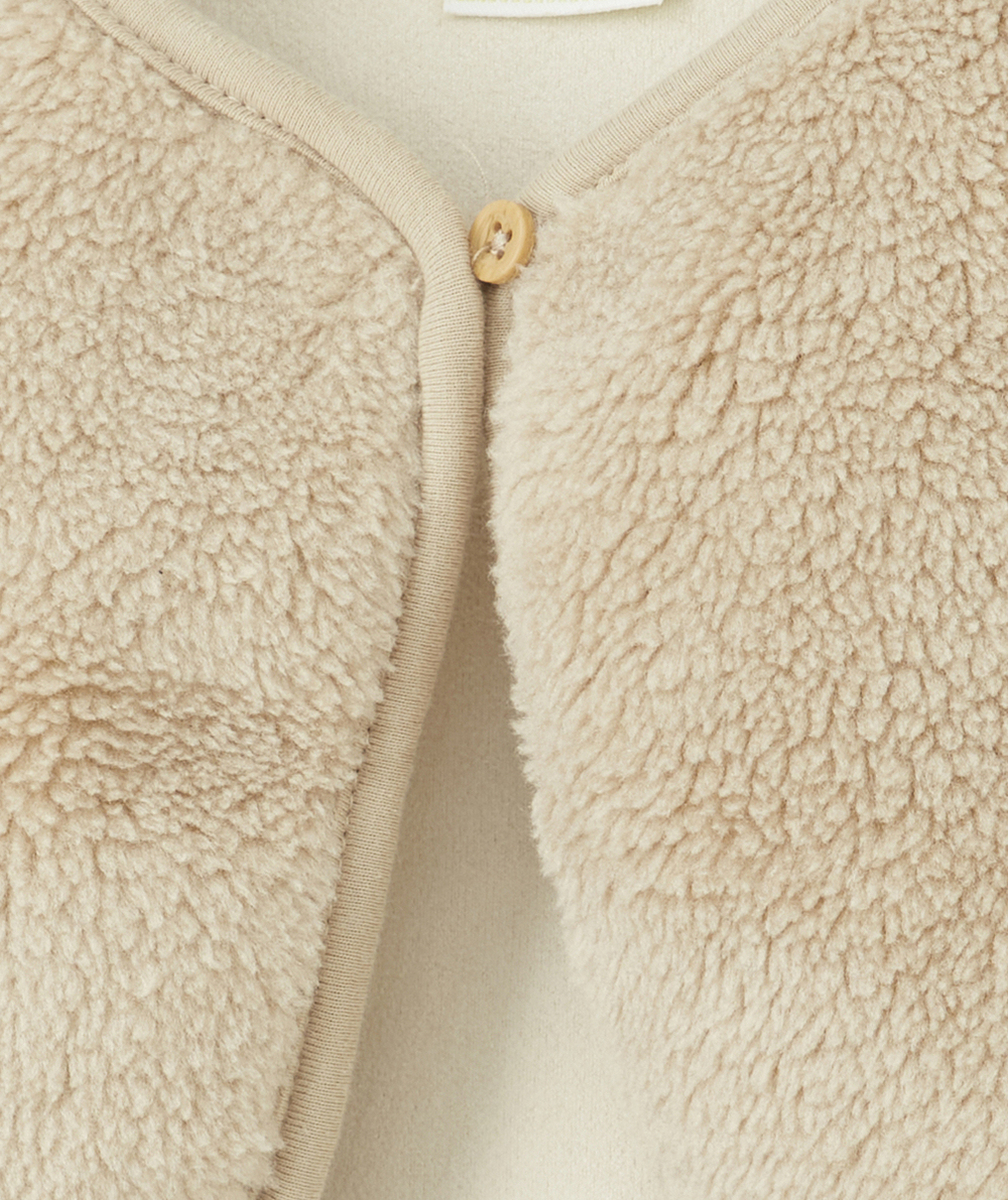 GILET SANS MANCHES BÉBÉ EN SHERPA BEIGE