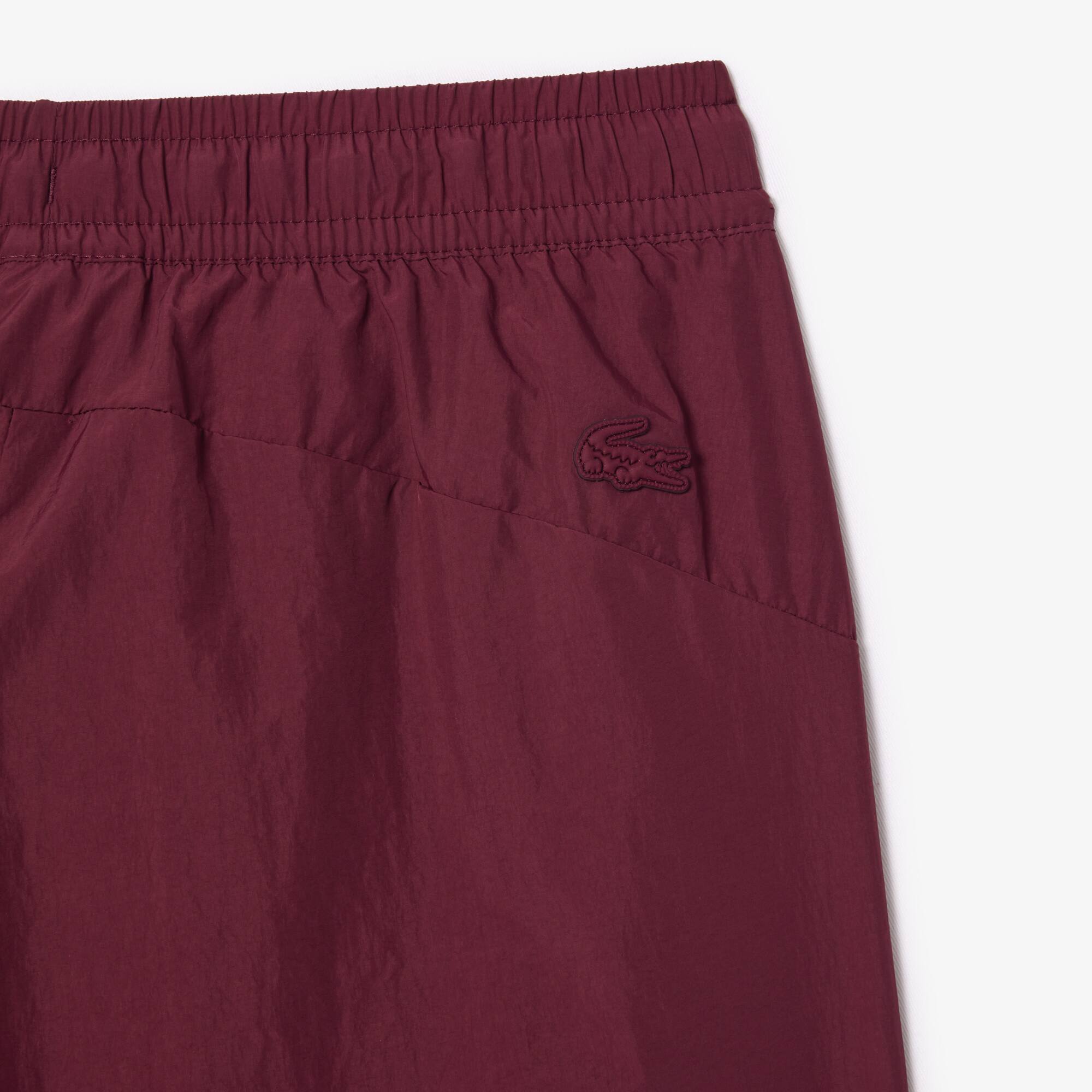 Pantalon de survêtement Sportsuit en nylon Pantalons de survêtement - Rouge - Lacoste - Femme