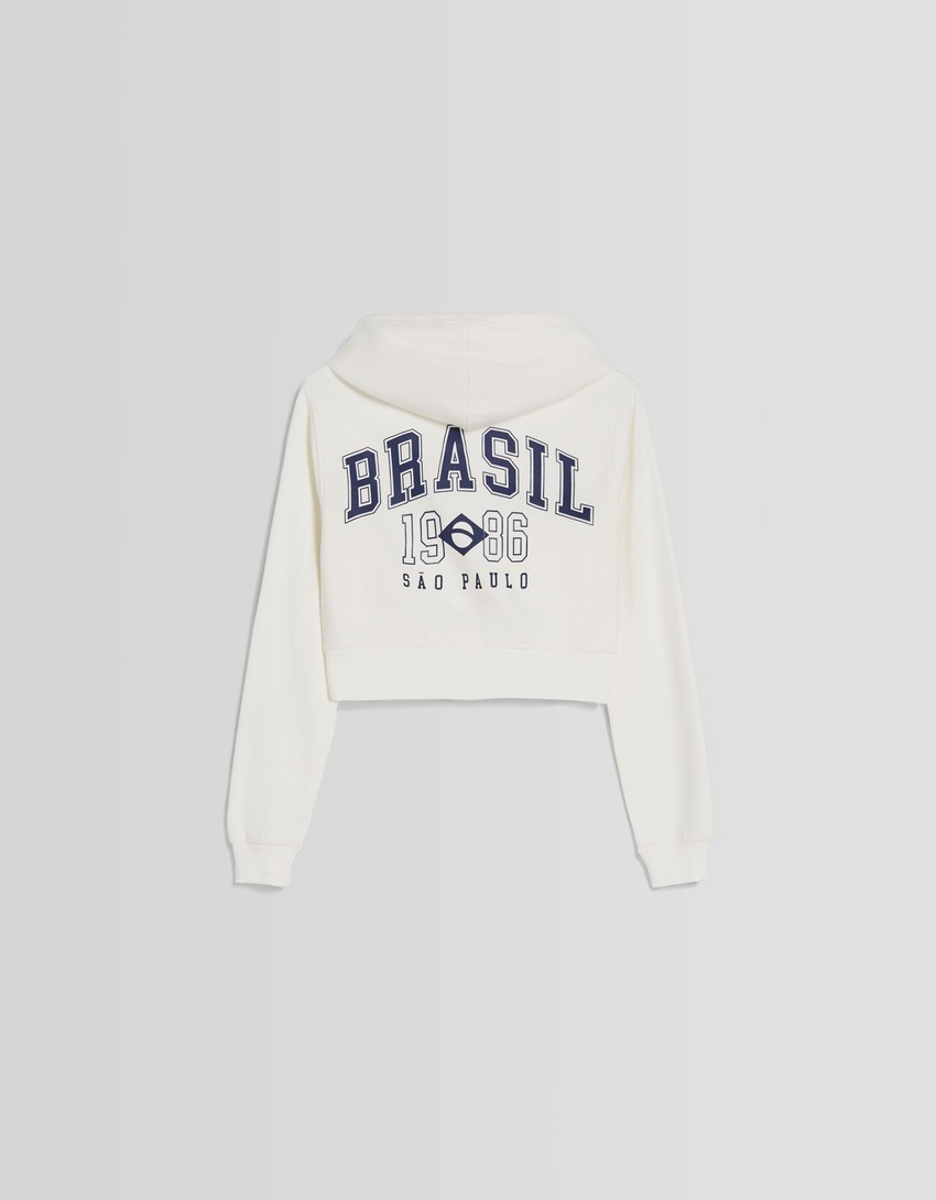 Blusa de moletom cropped com zíper e estampa.