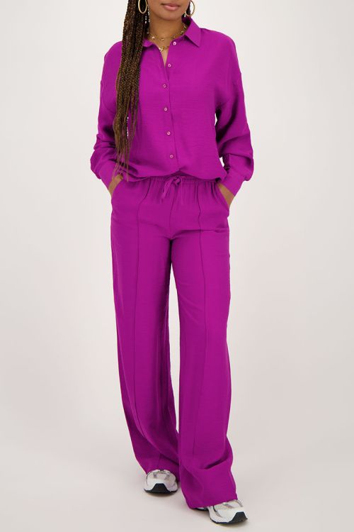 Paarse blouse met knopen