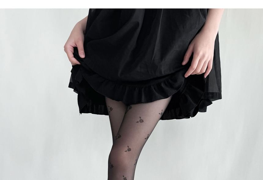 Allinya - Bloemen doorschijnende panty's