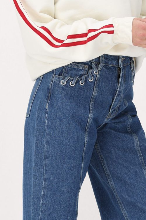 Donkerblauwe wide leg jeans met eyelets