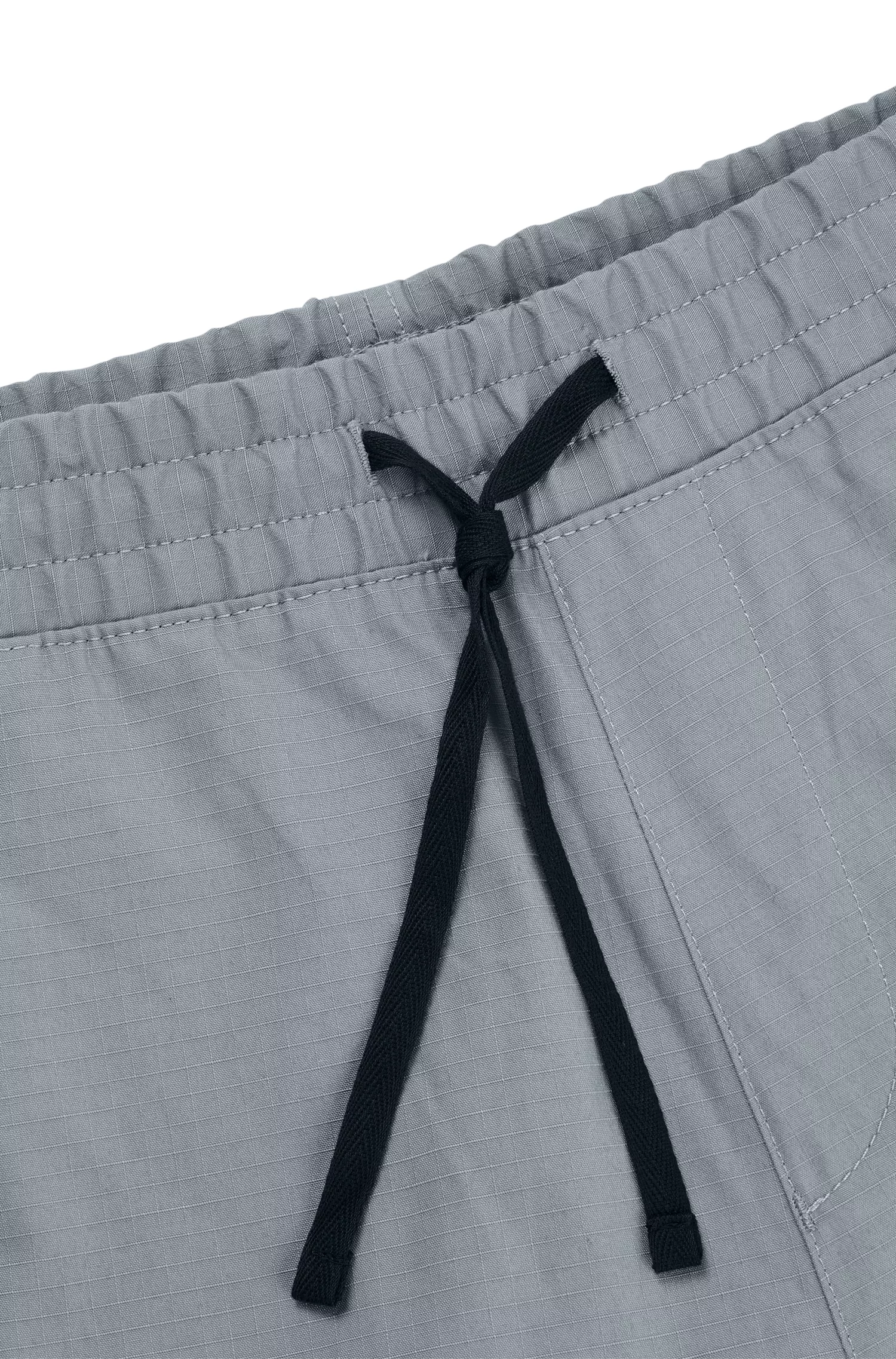 Calça cargo HUGO vermelha, corte regular, em algodão ripstop.