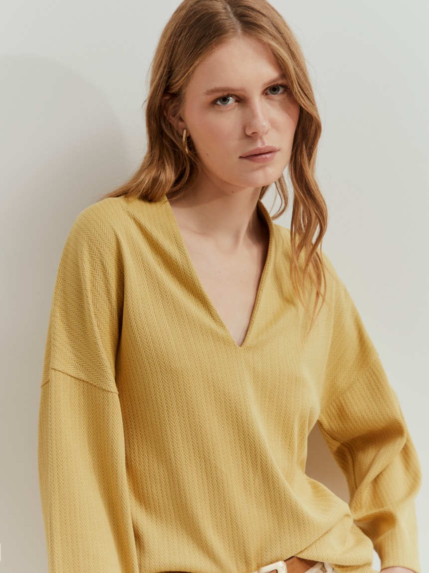 Camisola de malha espinha