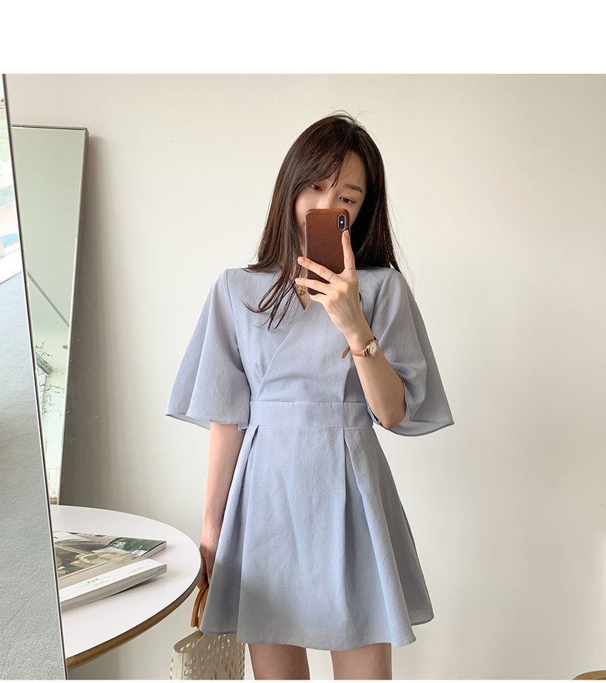 minaga - Playsuit met elleboogmouwen en V-hals