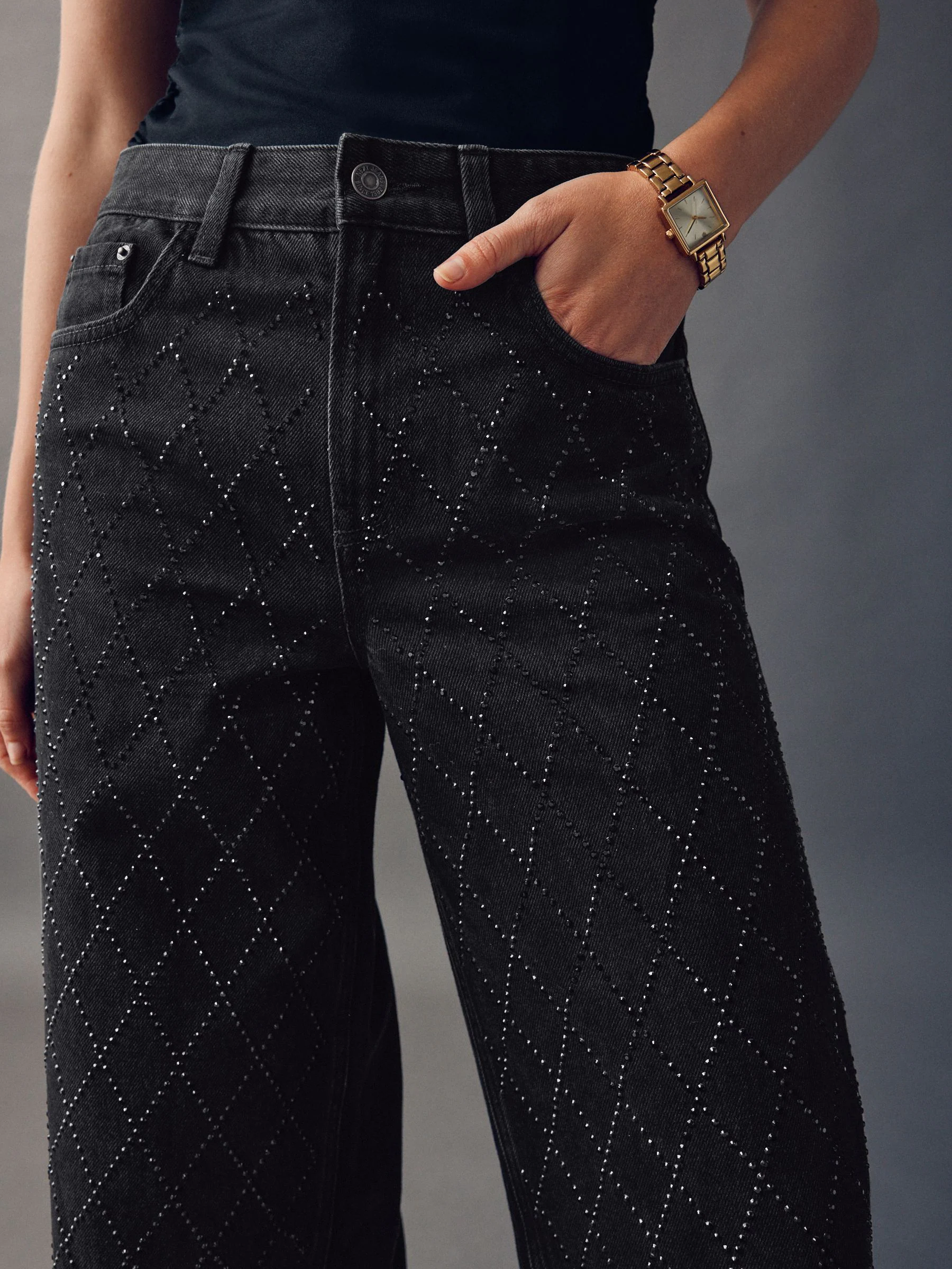 Zwart met sierstiksel - Jeans met wijde pijpen