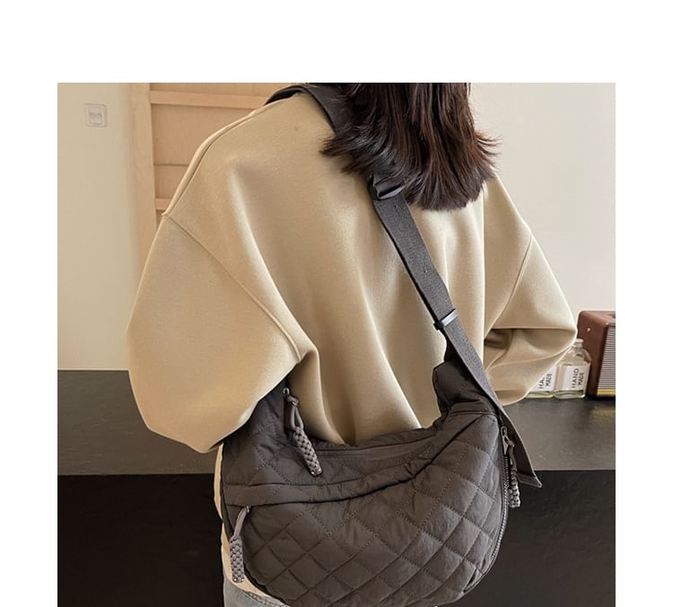 Hikuozy - Gewatteerde nylon crossbodytas met rits