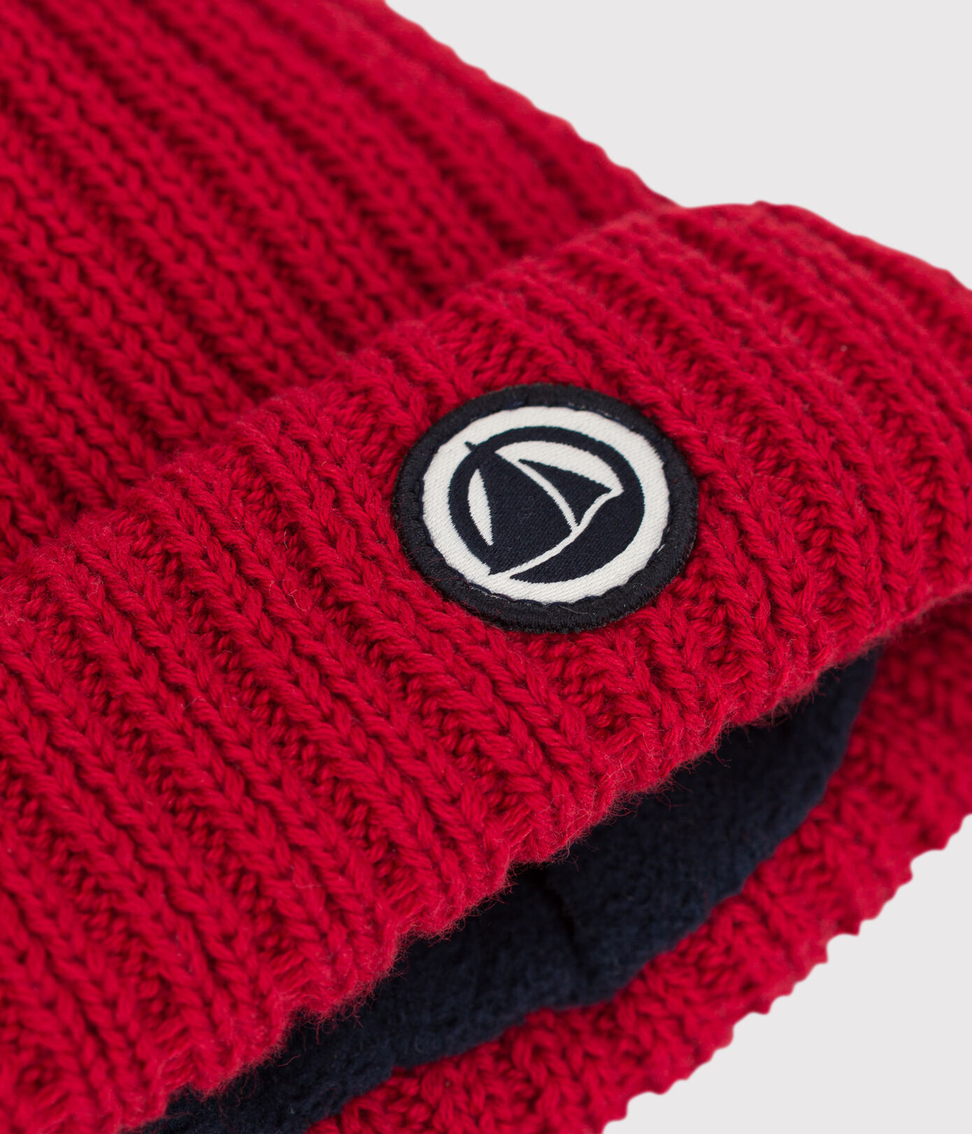Bonnet bébé en tricot doublé en polaire recyclée