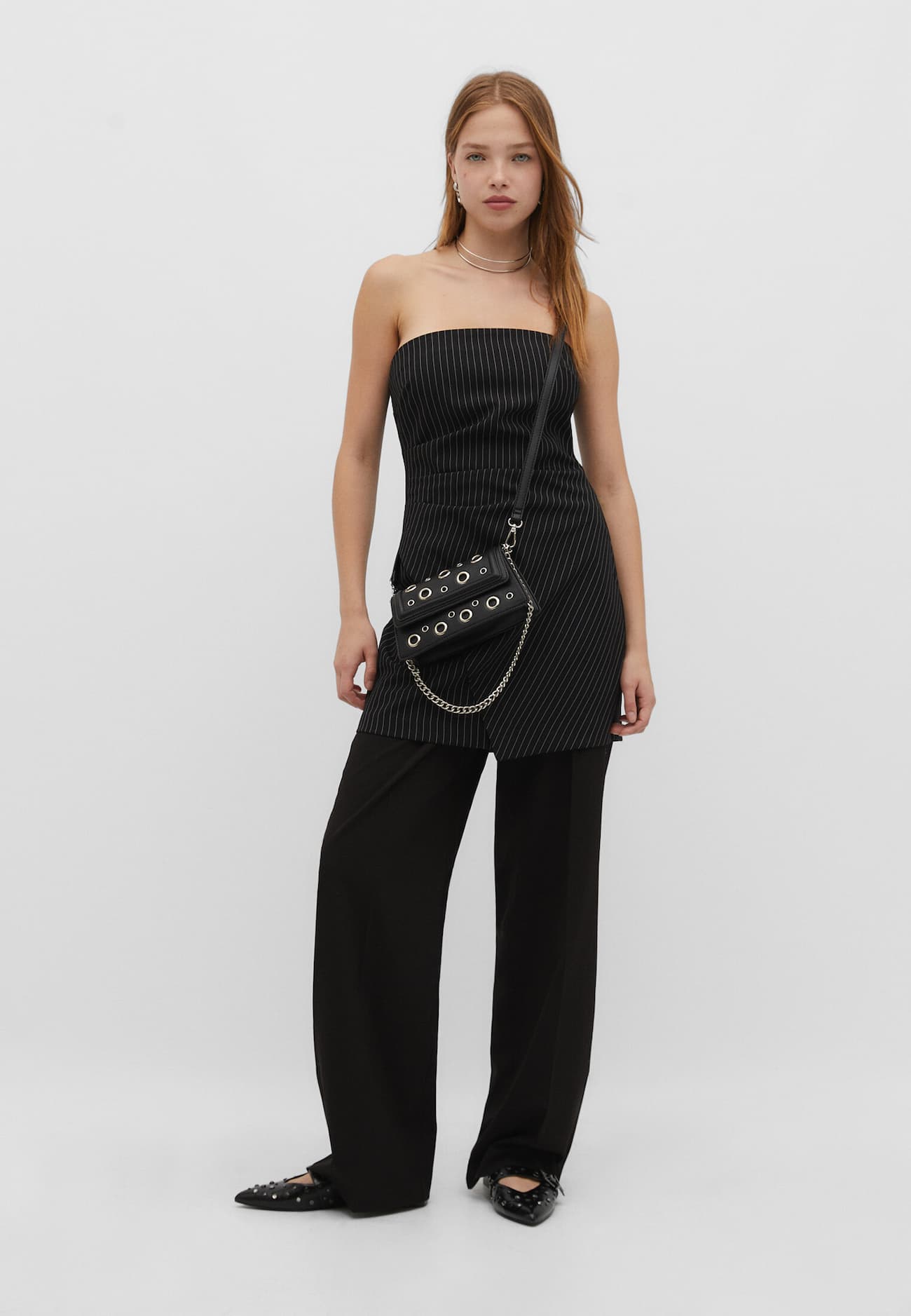 Bolsa transversal com ilhós