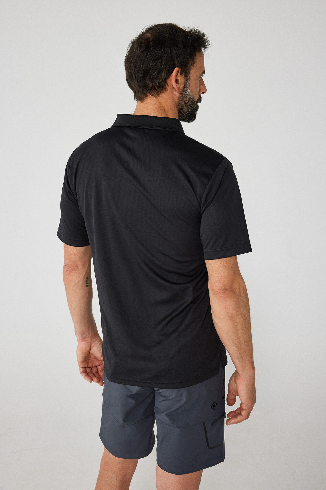 Camisa polo técnica de manga curta - Preta