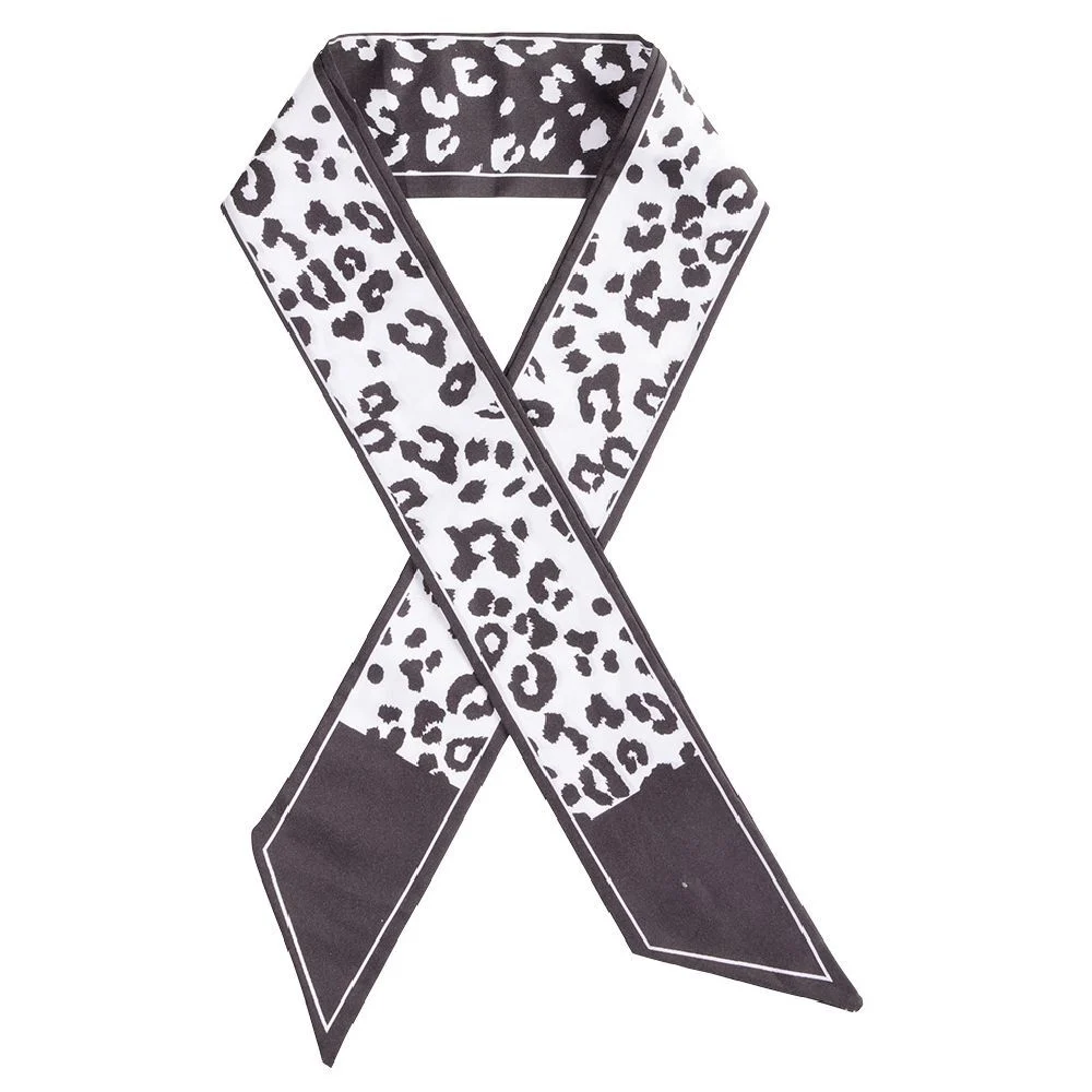 Ruban pour cheveux motif léopard noir et blanc