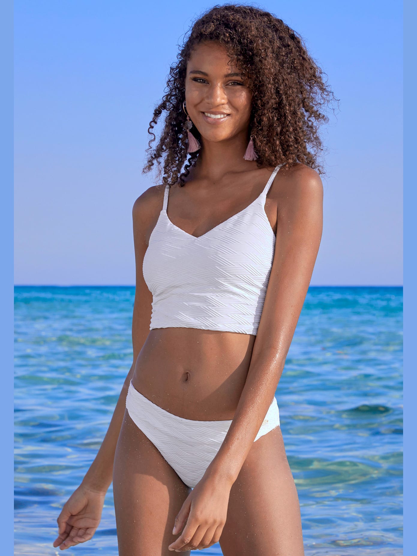 Haut de maillot de bain court matière structurée aux couleurs tendances
