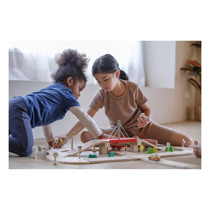 Plan Toys Circuit automobile et ses accessoires en bois