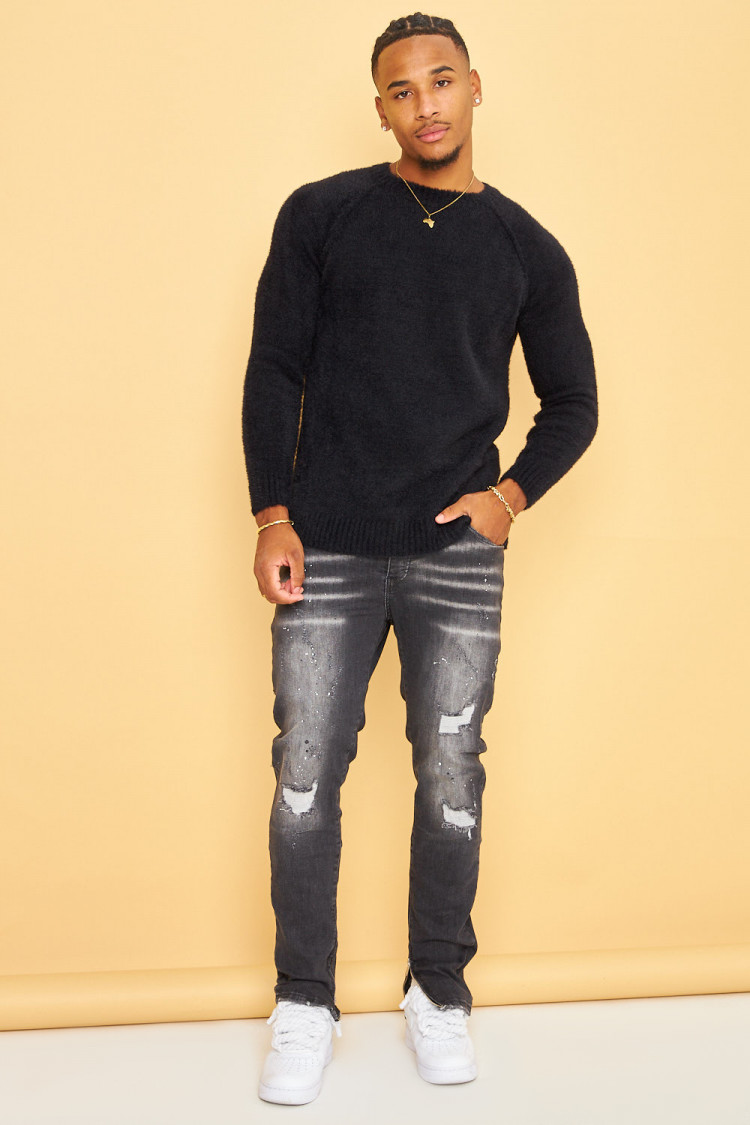 Jeans noir usé avec tâches et déchiré