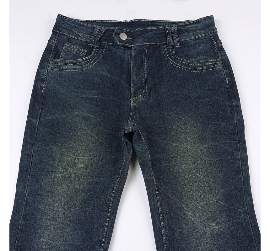 Puffie - Lage taille, gewassen bootcut jeans met pijlprint