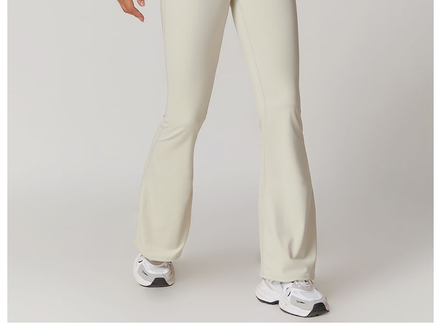 Skinniano - Haltertop met effen padding en open rug, cropped sporttop