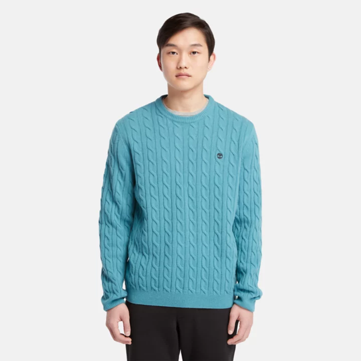 Suéter masculino Phillips Brook com gola redonda em tricô trançado na cor azul.