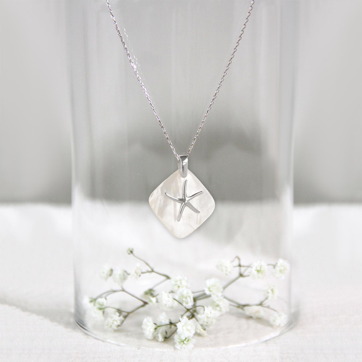 Pendentif Etoile de Mer nacre blanche sertie argent 925-Millième rhodié