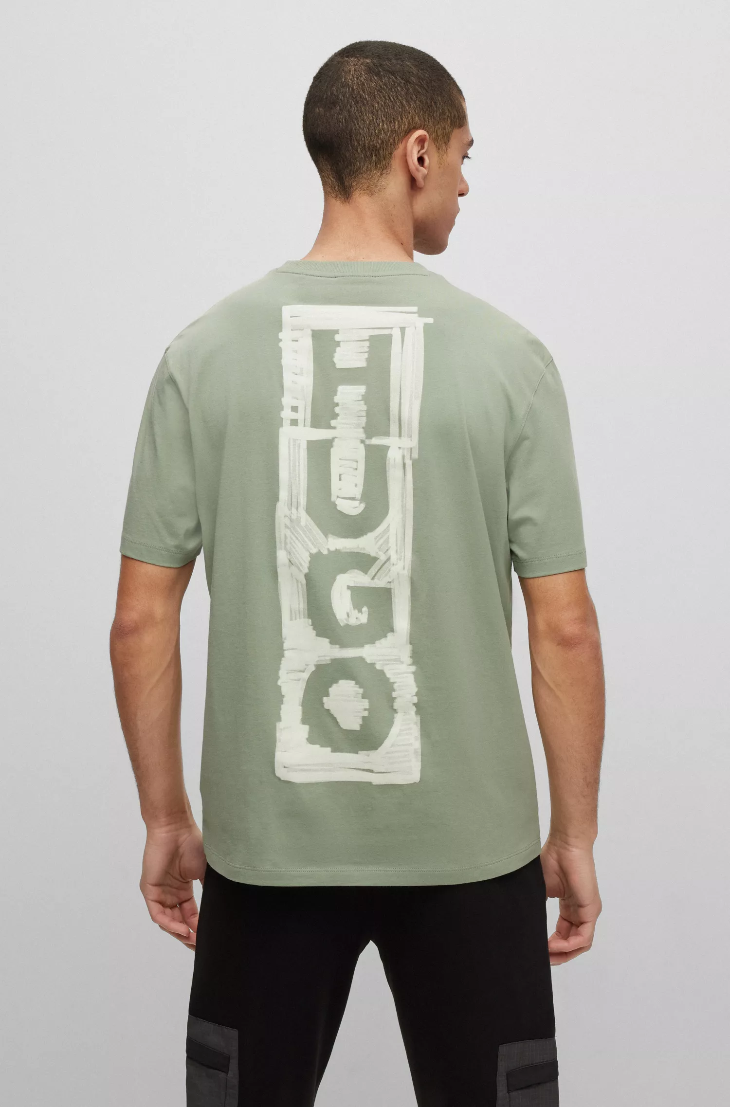 Camiseta HUGO vermelha em malha de algodão com logotipos inspirados em marcadores.